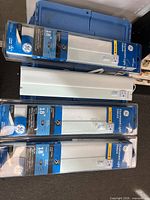 Four GE Advantage 18" fluorescent fixtures, three sealed one opened