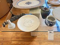 Entire lot on glass table showing all five items