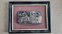 Front view of framed sterling silver Jerusalem relief plaque