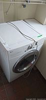 Front angle showing entire dryer with power cord