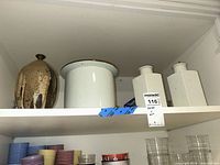 Shelf view showing all four vases