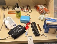 All items laid out showing monitor, grooming tools, consumables