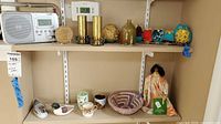 Entire lot displayed on shelving showing main items