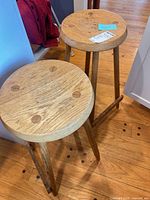 Both bar stools side by side showing seats and legs