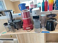 Group view of all appliances and accessories on shelf