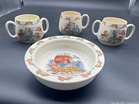 Three Bunnykins cups and one bowl front view