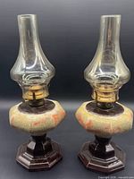 Both ceramic oil lamps full view