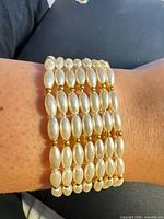 Bracelet worn on wrist showing full multi-strand design