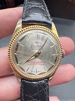 Dial close-up showing Sea Diver branding, bezel, wear