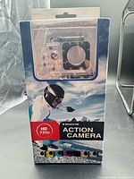 Front of retail box showing camera in waterproof housing and HD 720p labeling