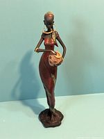 Full view of African woman figurine front