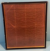 Full view of framed Declaration of Independence produced on brown parchment-like paper