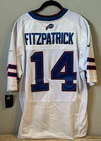 Back view showing nameplate and #14, hang tag visible