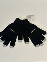 top view of both gloves showing logos and grey conductive tips