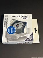 Front view of retail box showing device through window