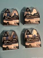 Front view of four GP Thunder bulb packs showing labels