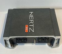 Front angled view showing HERTZ EP2 amplifier, terminal blocks visible