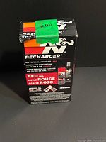 Front view of boxed K&N Recharger kit showing branding and model number