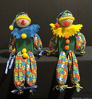 Both clown dolls front view