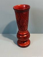 Full view of carved wooden vase front