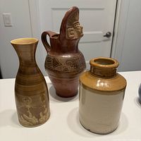 Three pottery pieces side by side