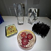 All four paperweights grouped on table