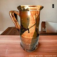 Full view of glazed pottery jug pitcher vase front profile