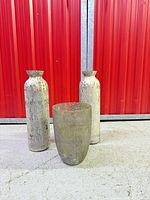 Group shot of three glass vases showing styles and finish