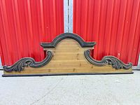 Front view of entire wall pediment showing size and design