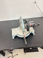 Overall view of Delta compound miter saw on table