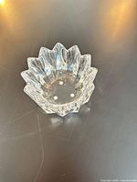 Top angled view showing starburst rim and clear crystal form