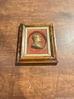 Framed relief portrait full view