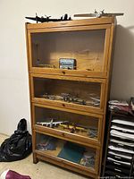 Full view of oak barrister bookcase showing four sections and overall condition