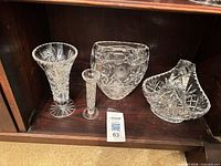 All four crystal pieces on shelf