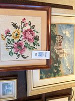 Close-up floral bouquet and castle landscape needlepoints