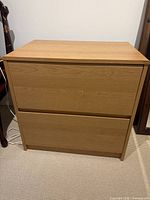 Front view showing two drawers and veneer finish