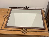 Front view of mirror showing full frame and glass