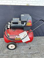 Left side view showing tank, motor, decals