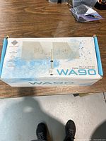 Top view of sealed WA90 dual monitor arm retail box