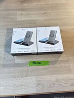 Front view of two boxed Mophie powerstation wireless docks