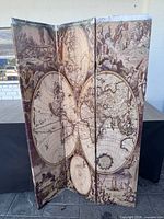 Full view of three-panel world map room divider