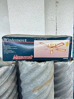 Front of box showing brand, model, size and image of fan