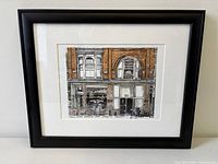 Frontal view of framed watercolour painting