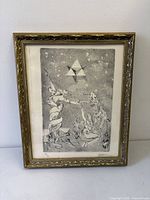 Front view of framed etching in gilt frame