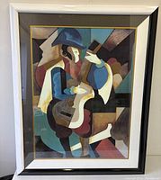 Full view of framed abstract cubist musician print
