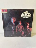 Front of album jacket showing artwork and Polydor logo