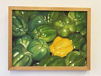 Front view of framed pepper still life painting