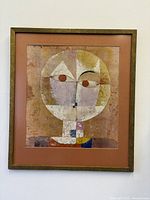 Full view of framed Paul Klee “Senecio” print
