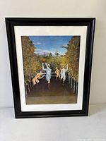 Full view of framed Rousseau print showing artwork, mat, and frame