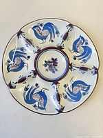 Top view of divided plate showing complete bird decoration